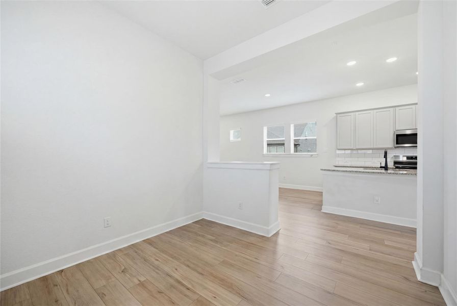 Spacious, unfurnished interior of a new home in The Groves 35', Humble (Image 32).