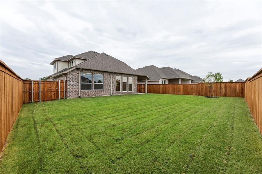 Front exterior of a new home in River Ranch, Van Alstyne, TX, highlighting curb appeal (Image 2). Front exterior of a new home in River Ranch, Van Alstyne, TX, highlighting curb appeal (Image 2).