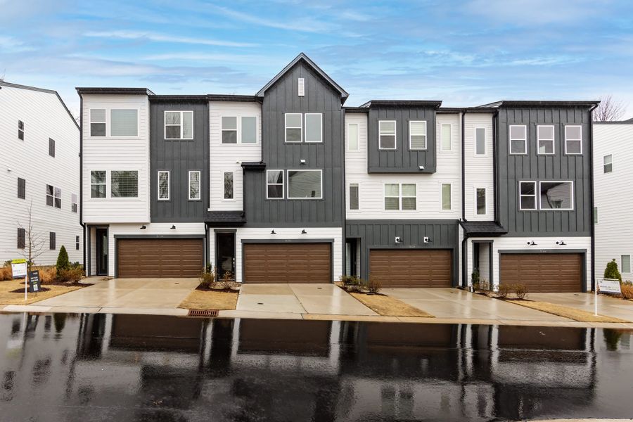 Front exterior of a new home in Archer Row, Charlotte, NC, highlighting curb appeal (Image 26). Front exterior of a new home in Archer Row, Charlotte, NC, highlighting curb appeal (Image 26).