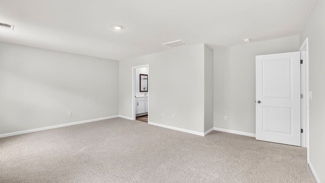 Spacious, unfurnished interior of a new home in Bentley Park, Greenwood (Image 31).