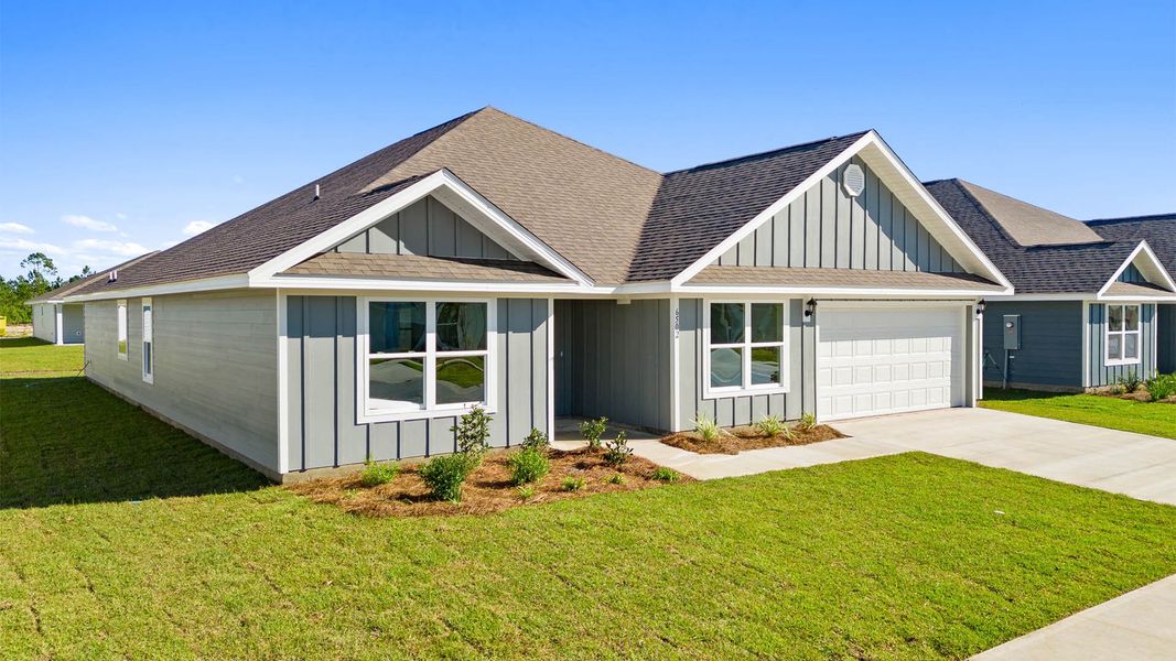 Front exterior of a new home in Liberty, Panama City, FL, highlighting curb appeal (Image 2).