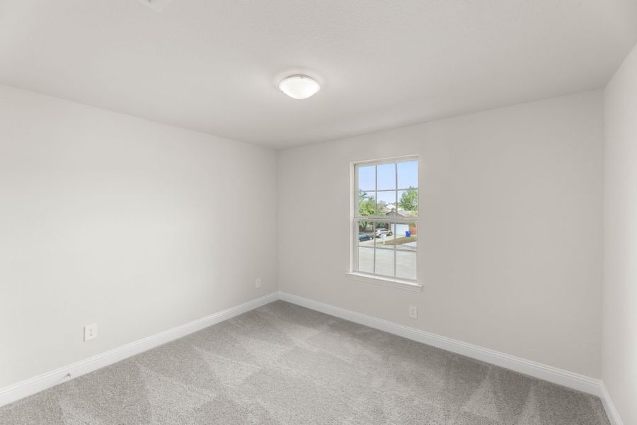 Front exterior of a new home in Main Street Village, Mansfield, TX, highlighting curb appeal (Image 19). Front exterior of a new home in Main Street Village, Mansfield, TX, highlighting curb appeal (Image 19).