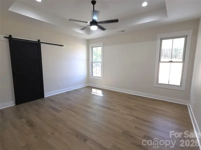 Spacious, unfurnished interior of a new home in , Albemarle (Image 10).