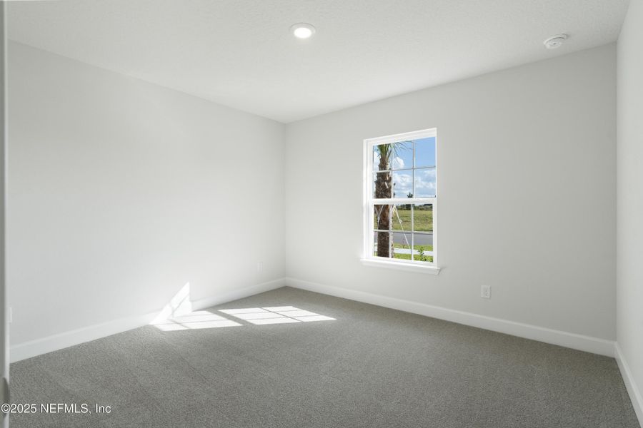 Spacious, unfurnished interior of a new home in Shadow Crest at Rolling Hills, Green Cove Springs (Image 14).