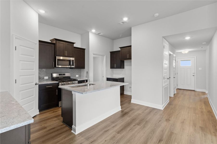 Furnished interior view inside a new home in River Ranch Trails, Dayton (Image 7).