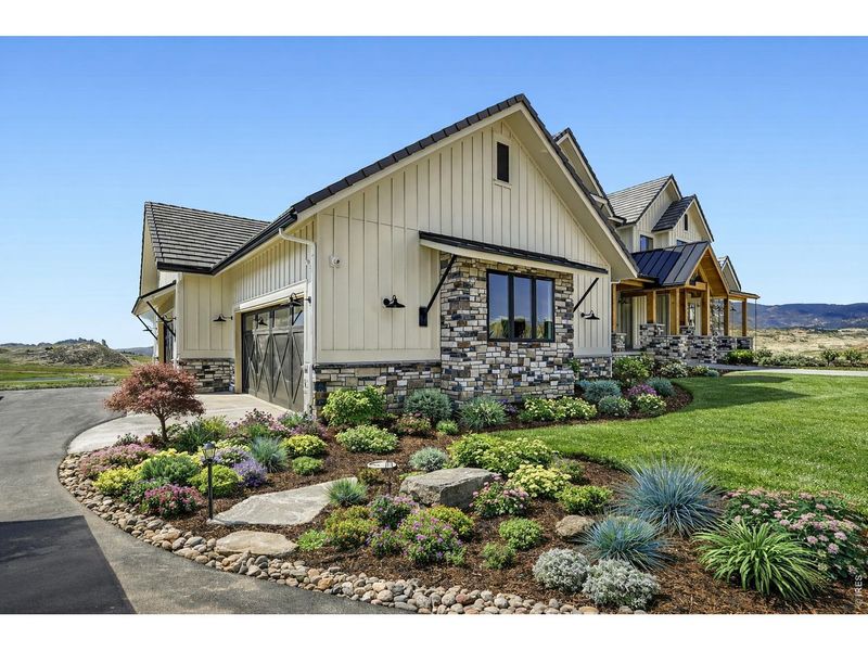 Front exterior of a new home in , Greeley, CO, highlighting curb appeal (Image 26).