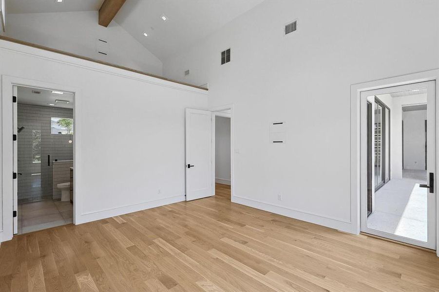 Spare room with light wood-type flooring and ceiling fan