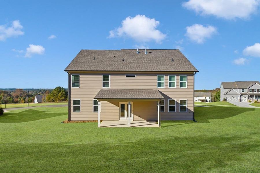 Exterior details and patio area of a home in Wellington Estates, Madison (Image 2). Exterior details and patio area of a home in Wellington Estates, Madison (Image 2).