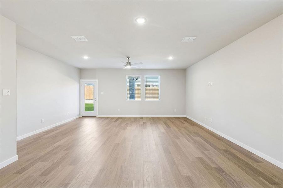 Living and Dining Room in the Haylee home plan by Trophy Signature Homes - REPRESENTATIVE PHOTO Living and Dining Room in the Haylee home plan by Trophy Signature Homes - REPRESENTATIVE PHOTO