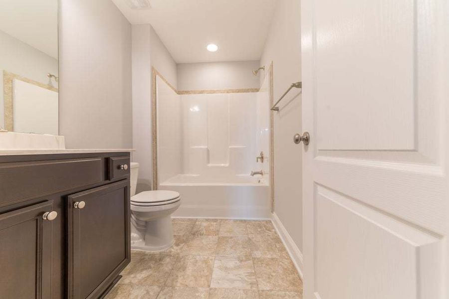 Representative furnished interior of a home built from the Aberdeen by Caviness & Cates Communities in Bartlett Manor, Youngsville (Image 55).