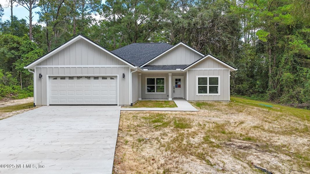 Front exterior of a new home in , Melrose, FL, highlighting curb appeal (Image 24).