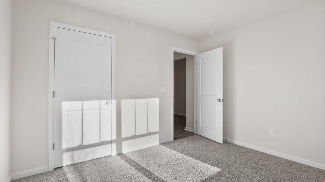 Spacious, unfurnished interior of a new home in Bentley Park, Greenwood (Image 15). Spacious, unfurnished interior of a new home in Bentley Park, Greenwood (Image 15).