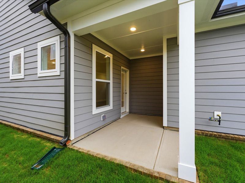 Exterior details and patio area of a home in Whitley Preserve – Park Collection, Mint Hill (Image 4).