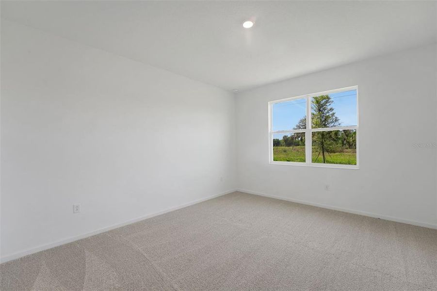 Spacious, unfurnished interior of a new home in Willowbrook North, Winter Haven (Image 17).