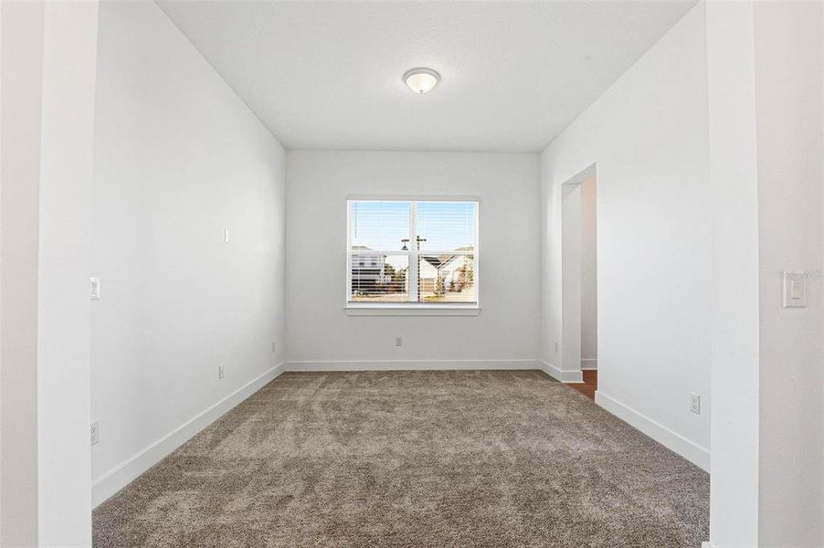 Spacious, unfurnished interior of a new home in Vida's Way, Wesley Chapel (Image 46).