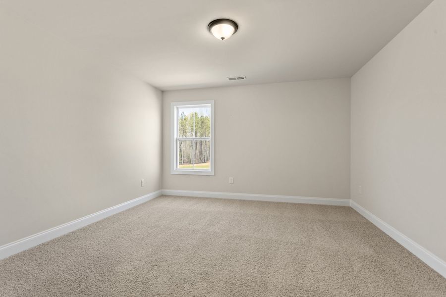 Spacious, unfurnished interior of a new home in Cherokee Knoll, Williamston (Image 24).