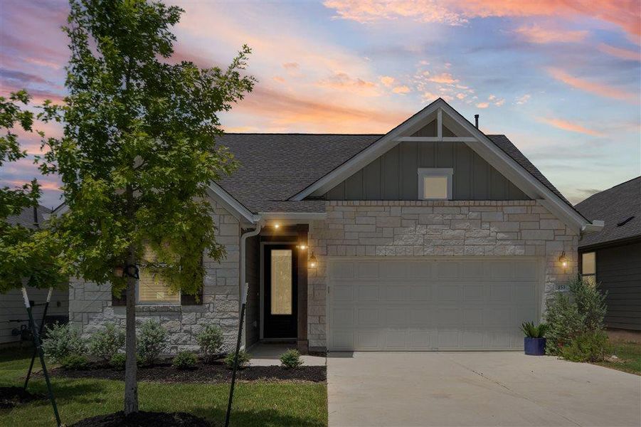 Front exterior of a new home in , Dripping Springs, TX, highlighting curb appeal (Image 2). Front exterior of a new home in , Dripping Springs, TX, highlighting curb appeal (Image 2).