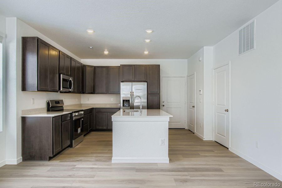Furnished interior view inside a new home in Sterling Ranch: The Parkside Collection, Littleton (Image 6).