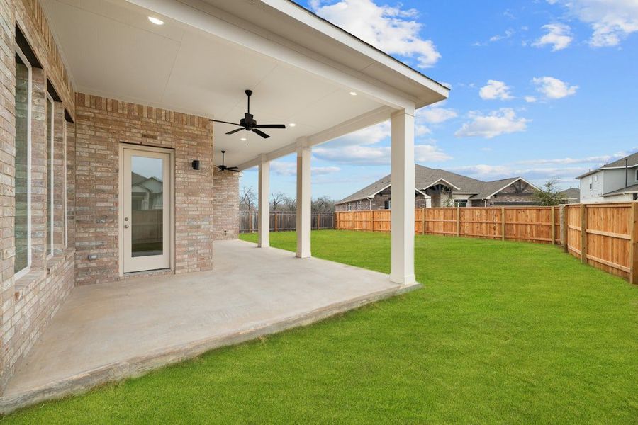 Exterior details and patio area of a home in Santa Rita Ranch, Liberty Hill (Image 23).