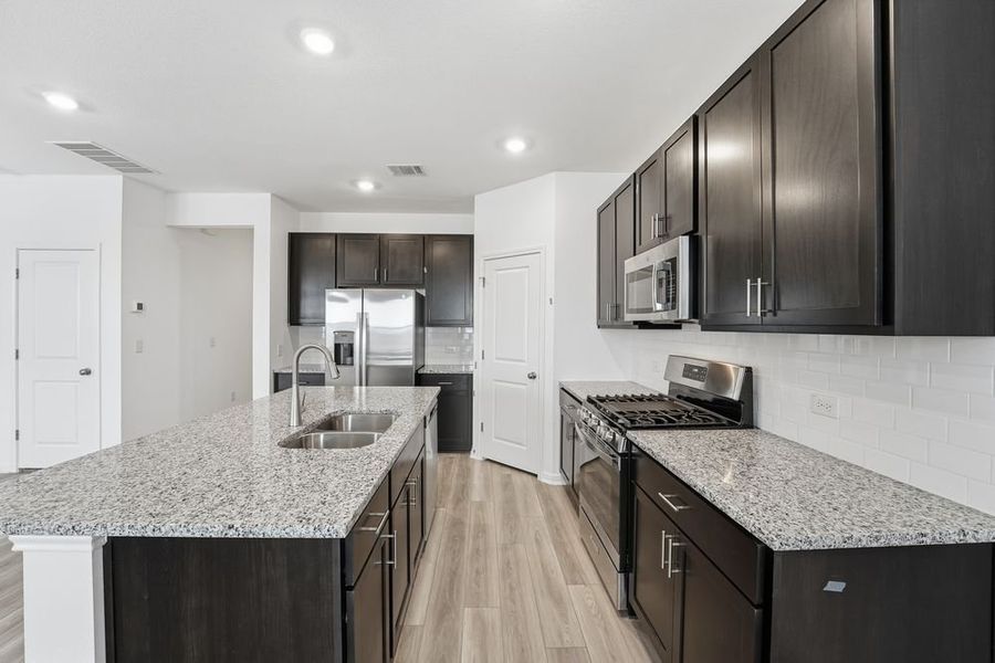 Furnished interior view inside a new home in Longview, Del Valle (Image 6).