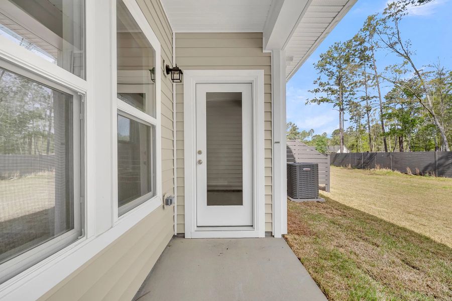 Exterior details and patio area of a home in Hammock Walk at Nexton, Summerville (Image 13).