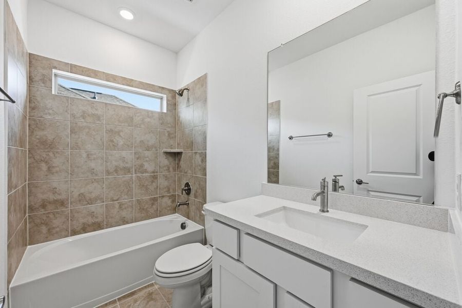 Representative furnished interior of a home built from the Rhone by Taylor Morrison in South Oak 50s, Oak Point (Image 8).
