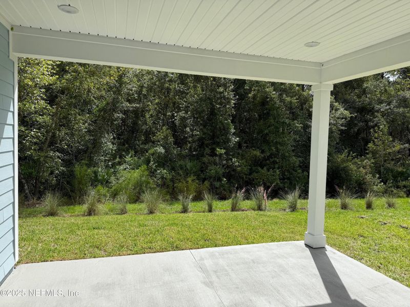 Exterior details and patio area of a home in The Preserve at Concourse Crossing, Fernandina Beach (Image 3).