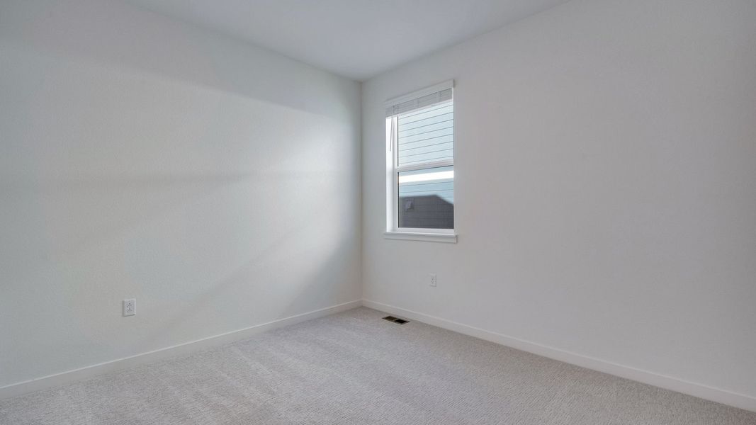 Spacious, unfurnished interior of a new home in Trails at Crowfoot, Parker (Image 25).