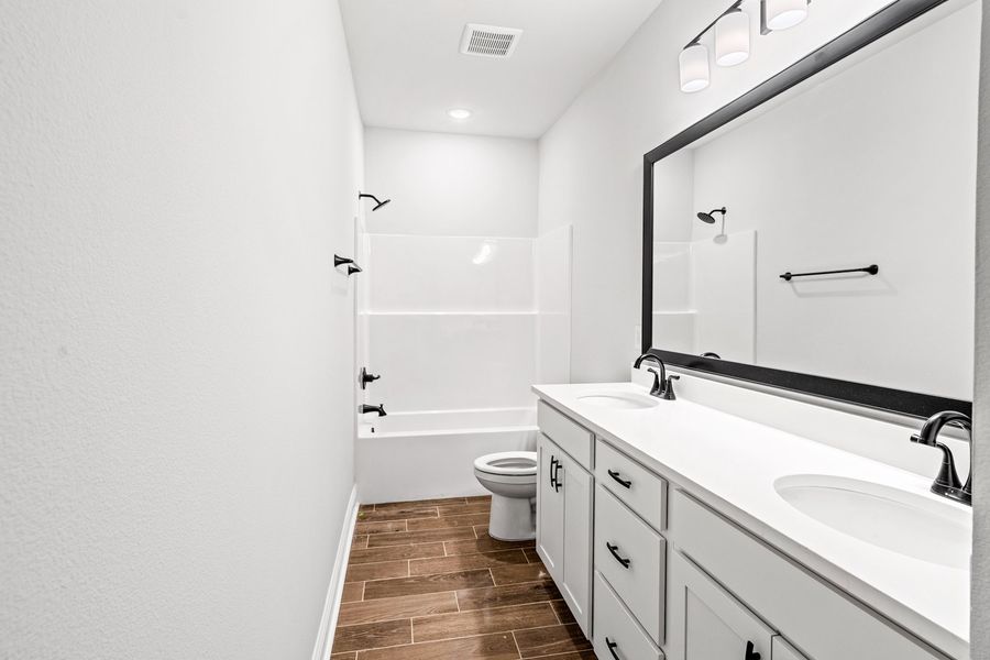 Furnished interior view inside a new home in Sentinel Ridge, Pace (Image 8).