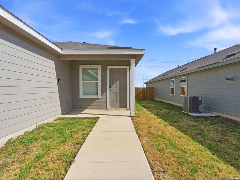 Exterior details and patio area of a home in Torian Village, San Antonio (Image 21).