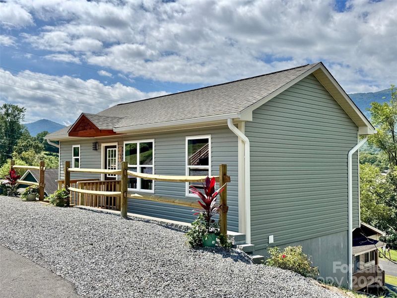 Front exterior of a new home in , Waynesville, NC, highlighting curb appeal (Image 2). Front exterior of a new home in , Waynesville, NC, highlighting curb appeal (Image 2).