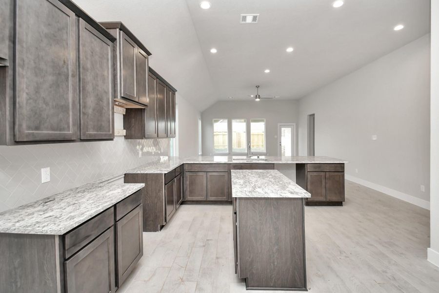 Example of completed home with similar plan. As-built colors and selections may vary.