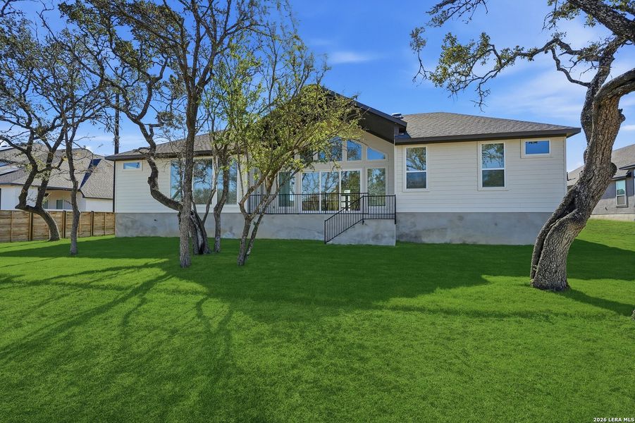 Exterior details and patio area of a home in Potranco Oaks, Castroville (Image 28).