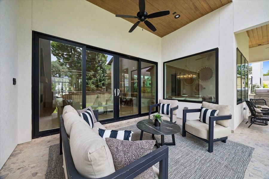 The covered patio sits just off the living room, creating a seamless extension of the main living space for outdoor dining, lounging, and entertaining. The covered patio sits just off the living room, creating a seamless extension of the main living space for outdoor dining, lounging, and entertaining.