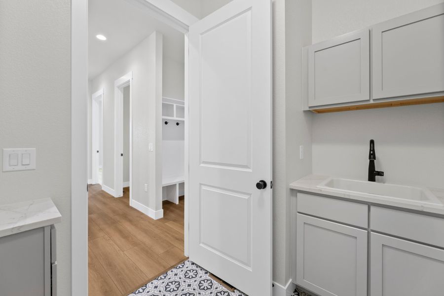 Representative furnished interior of a home built from the The Duxbury by Landmark Homes in Vernazza, Windsor (Image 6).