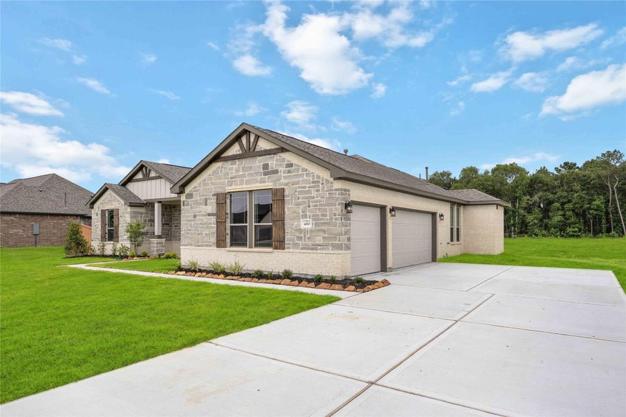 Front exterior of a new home in Barton Place, Cleveland, TX, highlighting curb appeal (Image 20).