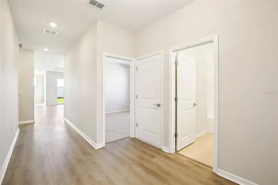 Spacious, unfurnished interior of a new home in Berry Bay, Wimauma (Image 5).