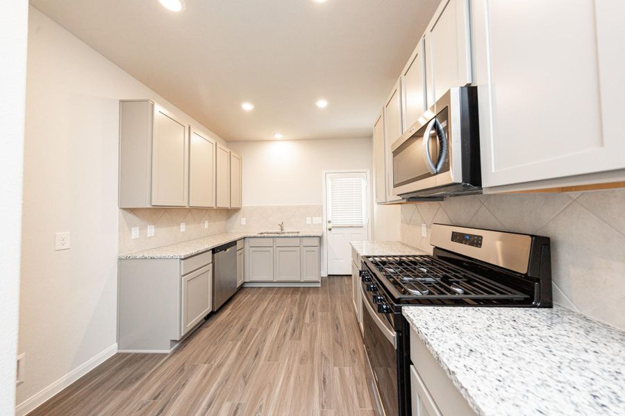Furnished interior view inside a new home in River's Edge, Conroe (Image 5).