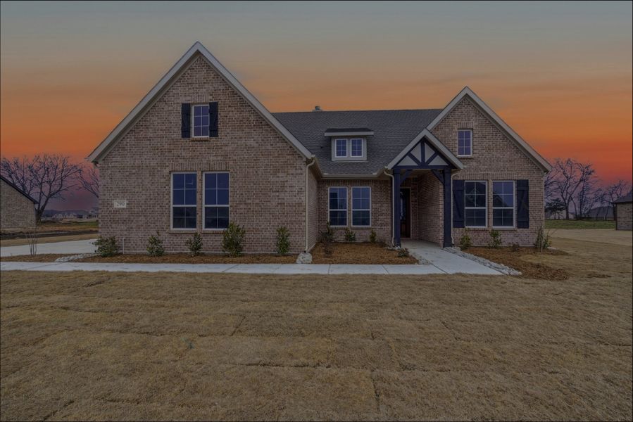 Front exterior of a new home in Fannin Ranch, Leonard, TX, highlighting curb appeal (Image 2). Front exterior of a new home in Fannin Ranch, Leonard, TX, highlighting curb appeal (Image 2).