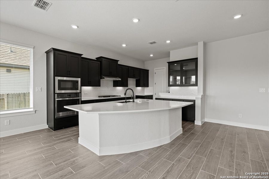Furnished interior view inside a new home in Village at Three Oaks, Seguin (Image 10). Furnished interior view inside a new home in Village at Three Oaks, Seguin (Image 10).