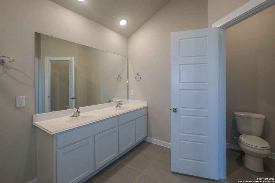 Furnished interior view inside a new home in Winding Brook, San Antonio (Image 4).