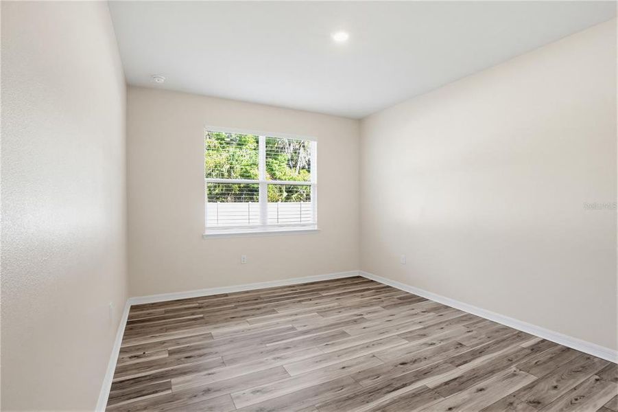 Spacious, unfurnished interior of a new home in Coddington, Bradenton (Image 27).