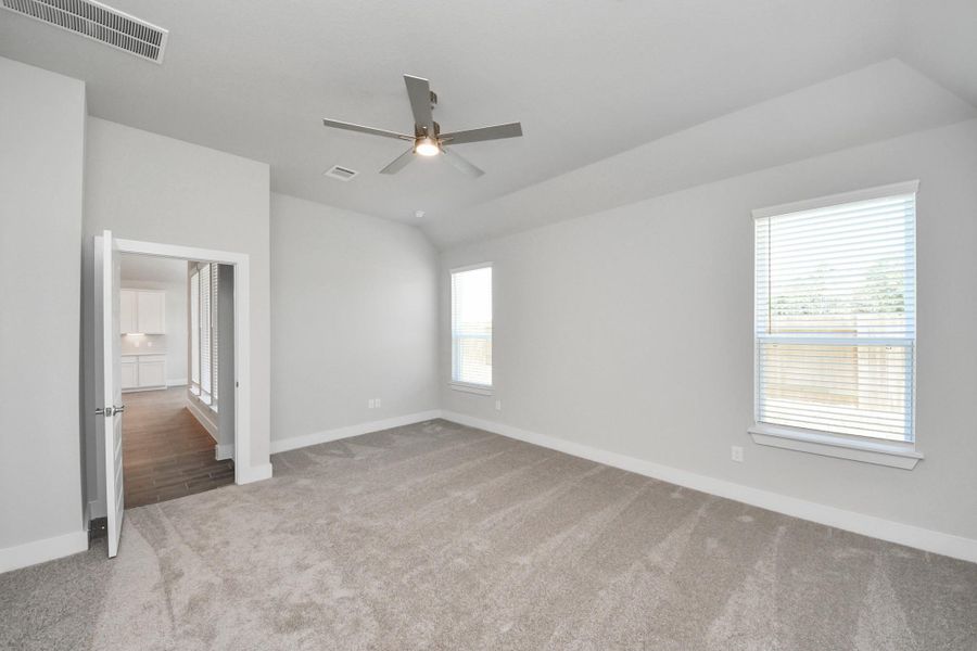 Escape and relax in the exquisite primary suite, a haven to unwind after a long day. The spacious room, boasts plush carpeting, soothing paint tones, high ceilings, and expansive windows adorned with privacy blinds. Escape and relax in the exquisite primary suite, a haven to unwind after a long day. The spacious room, boasts plush carpeting, soothing paint tones, high ceilings, and expansive windows adorned with privacy blinds.