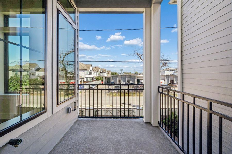Exterior details and patio area of a home in Spring Valley Creek, Houston (Image 25).