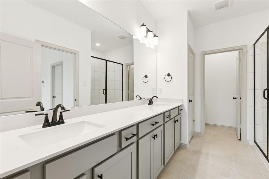 Your new owner's bath features a double vanity offering plenty of space for two and a spacious walk in shower!