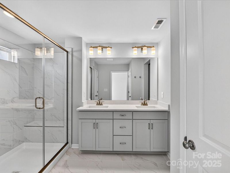Furnished interior view inside a new home in North Creek Village - Townhomes, Huntersville (Image 12).