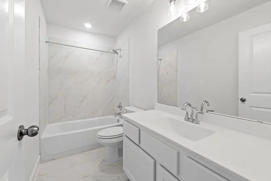 Furnished interior view inside a new home in Parmer Ranch, Georgetown (Image 14).