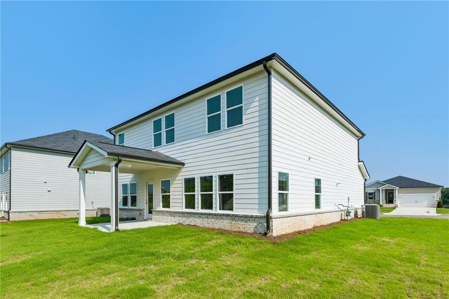 Exterior details and patio area of a home in Preserve at Mountain Creek, Pendergrass (Image 3).