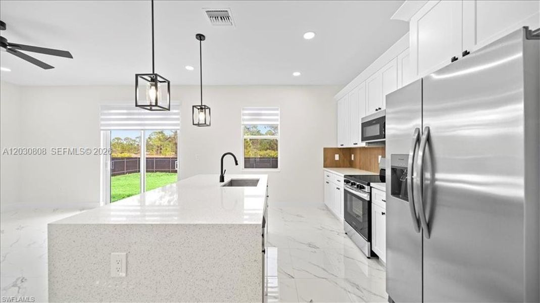Furnished interior view inside a new home in , Lehigh Acres (Image 5).