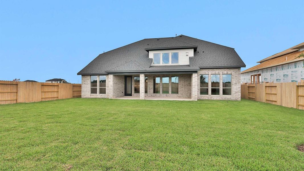 Exterior details and patio area of a home in Legacy Prairie at Katy Court, Katy (Image 3).